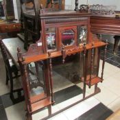 A mahogany overmantel mirror