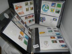 2 folders of 1990-2001 first day covers