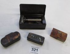 3 snuff boxes and a razor in bakelite case