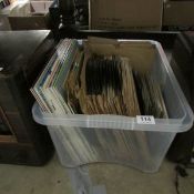 A box of 78rpm, 45rpm and LP records