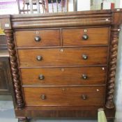 A 2 over 3 mahogany Scotch chest with barley twist columns