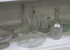 A mixed lot of glass bowls, cake stands, jug, decanters etc