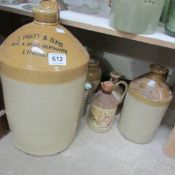 A quantity of stoneware jars