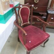 An Edwardian arm chair