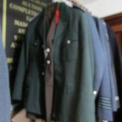 A German police officers jacket and an Austrian customs uniform