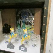 A Babycham clock mirror, 7 Babycham glasses, 2 Babycham figure and brushes