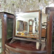 An oak toilet mirror