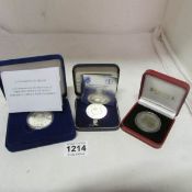 3 cased silver commemorative coins being Charles & Camilla crown, Penny Black crown and1977 Lord