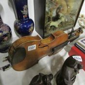 A violin and 3 bows