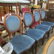 A set of 4 mahogany cabriole leg balloon back chairs