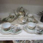 A Japanese eggshell china tea set