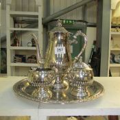 A 3 piece silver plated tea set on tray