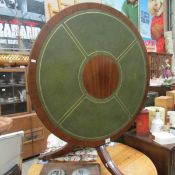 A tip top table with leather insets