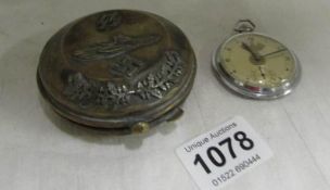 A German pocket watch in metal case