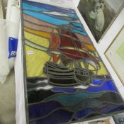 A large stained and leaded glass panel