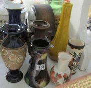 A quantity of vases including Royal Doulton