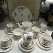 A 22 piece Royal Albert Moss Rose tea set (teapot missing lid)