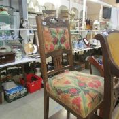 An Edwardian chair with floral upholstery