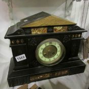 A black slate mantel clock