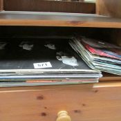 A quantity of 45rpm and LP records including Beatles