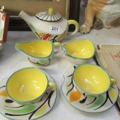 A Studio pottery 2 person tea set signed Fait Minn
