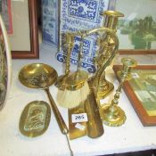 A mixed lot of brassware including candlesticks etc