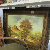 A gilt framed country scene