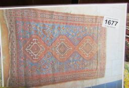 An Eastern Shariz rug, 116 x 176cm
