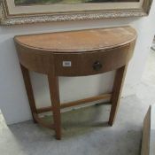 A D shaped hall table