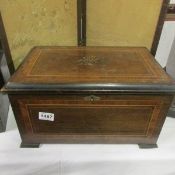 A Victorian music box with 3 bells and in good working order