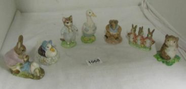7 Beswick Beatrix Potter figurines including Old Mr Bouncer, Tom Kitten etc