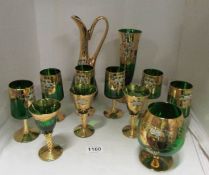 A quantity of green glass with gilt decoration including set of 6 wine glasses