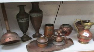 A mixed lot of copper ware including measures