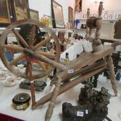 An old spinning wheel, a/f