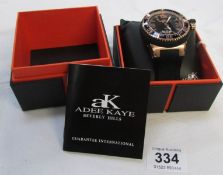 A boxed A K Beverley Hills wrist watch