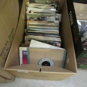 A quantity of 45rpm records including T Rex, Ringo Starr etc.