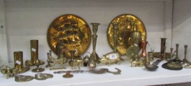 A mixed lot of brassware including candlesticks etc