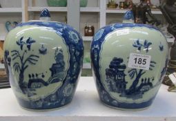 A pair of blue and white Ginger jars
