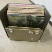 A box of albums, Dylan, John Mayall, Stones, Who, Pink Floyd etc