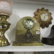 A brass 'Adam' style mantel clock