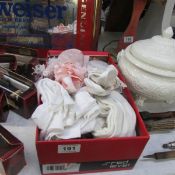 A box of ballet shoes and other dance items