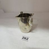 A silver 2 handled cream jug, Wakely & Wheeler, London 1939/40, 113g