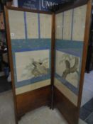 A fine Victorian 2 fold screen with embroidered silk birds on linen
