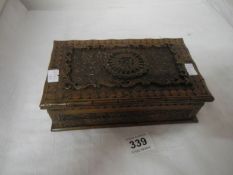 A Chinese carved wood box with secret lock