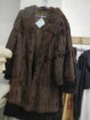 A fur coat and a faux fur coat