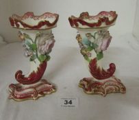 A pair of flower encrusted 'Cornucopia' vases