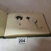 An autograph book with illustrations