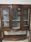 A Victorian inlaid mahogany 3 door display cabinet