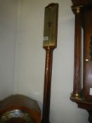 A mahogany stick barometer by Comitti, Holborn,London