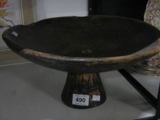 A tribal bowl on stand
